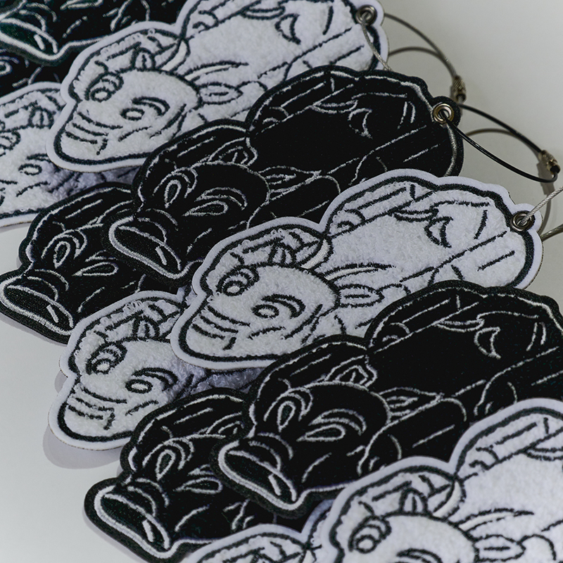 9 Pigs Embroidered Keychain, , large