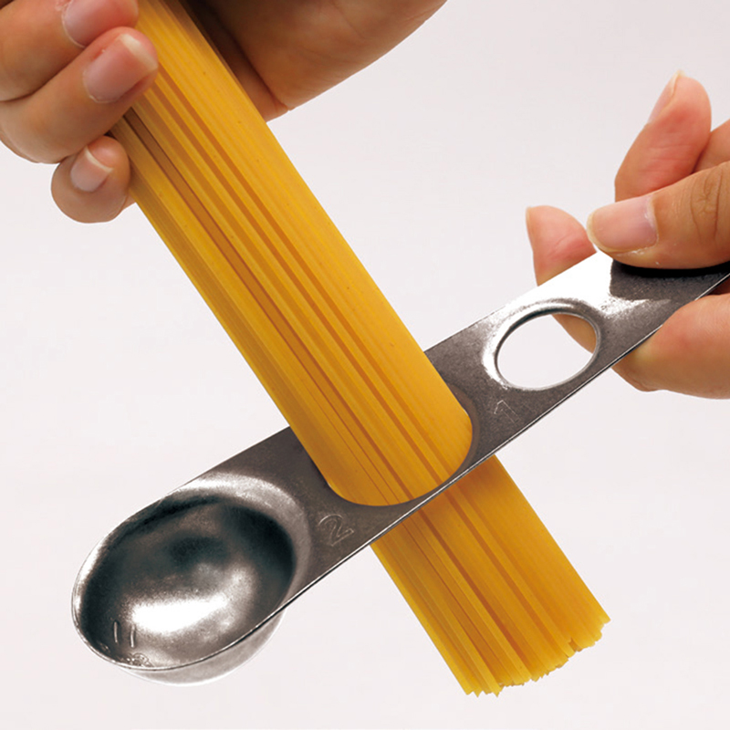 A measuring spoon that can also be used to measure pasta, , large